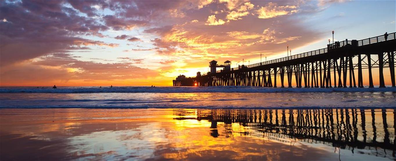 pier into ocean at dusk